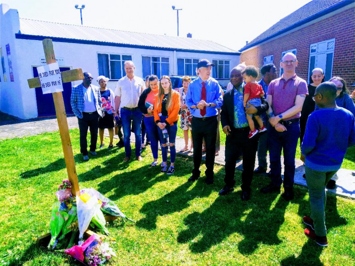 Celebrating Good Friday outside in the sun after service